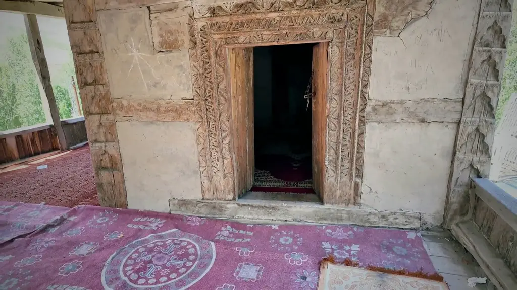 Small carved door of the 400-year-old mosque in Gulmit, Hunza