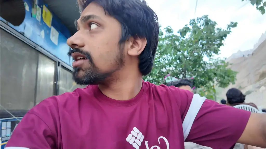 Hafiz Tayyab before trying the Rs 1,200 yak burger in Sost